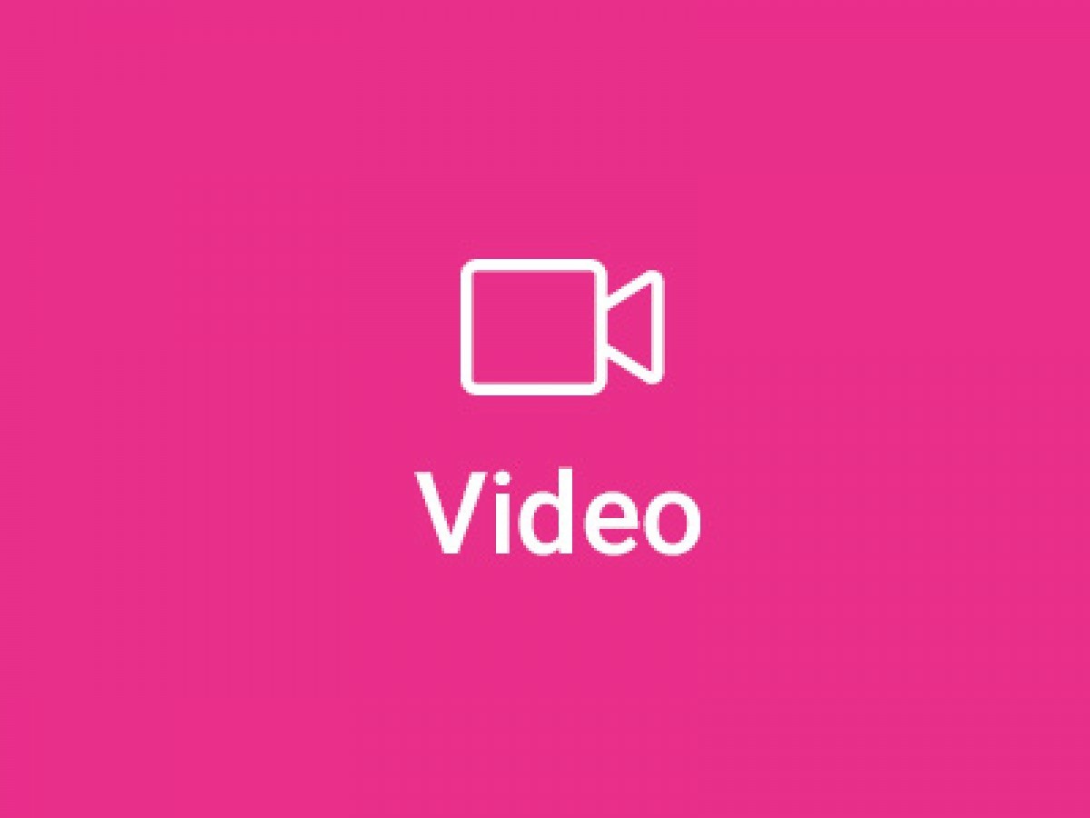 pink icon of video camera with video written under it