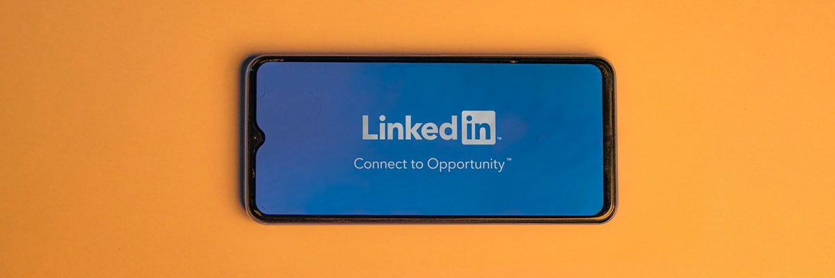 smartphone with LinkedIn logo on screen