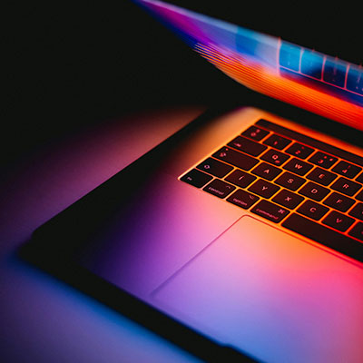 laptop-with-colours-diffusing-from-screen