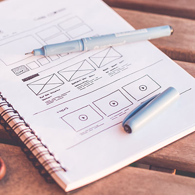 book-with-website-mockups-drawn