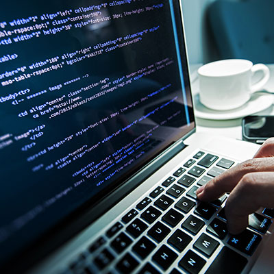 person-typing-code-on-laptop