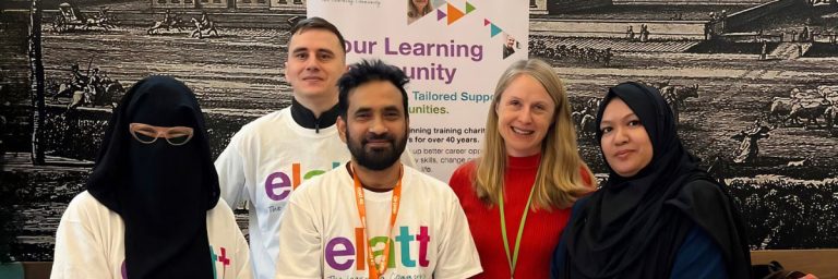 ELATT adult leaners standing together smiling